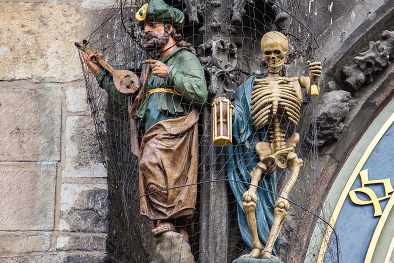 A figure of Death (represented by a skeleton) tolling the bell; a Turkish man shaking his head