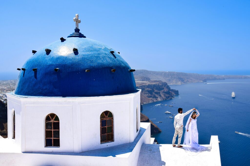 Couple enjoying the view in Santorini, Greece