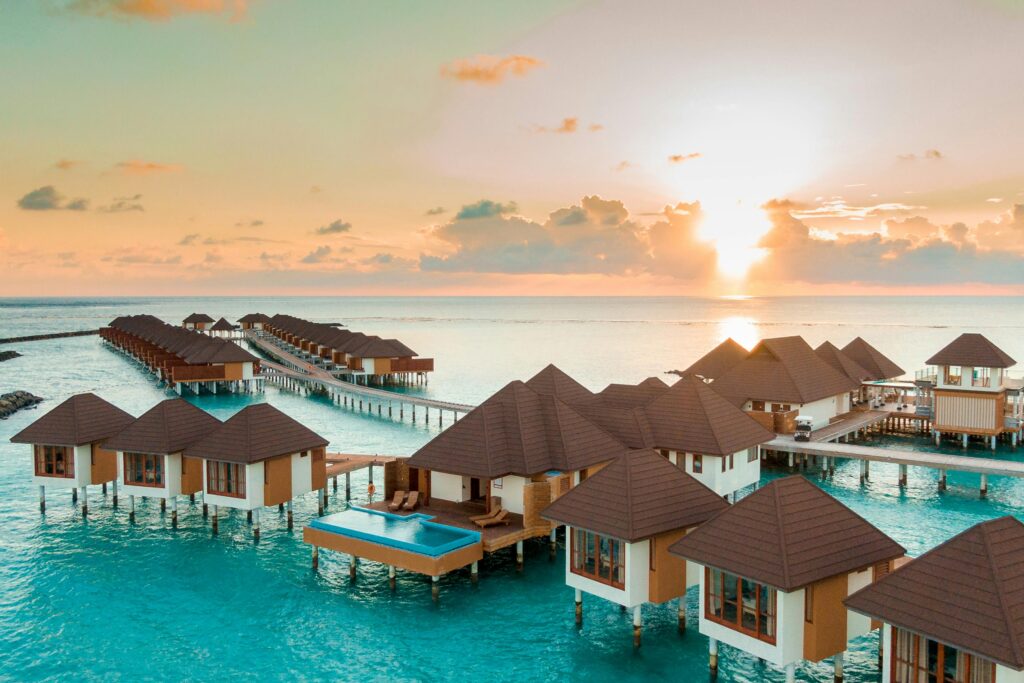 Overwater villas in Maldives at sunset