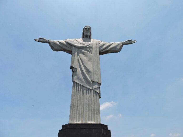 Christ the Redeemer overlooking Rio de Janeiro at sunrise